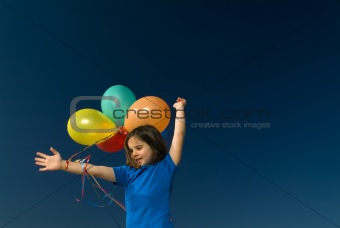 girl and baloons