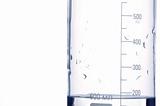 water in a chemical measure glass