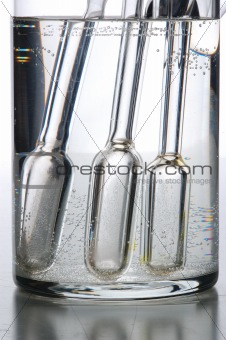 chemistry tube on glass table