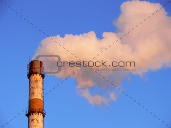 Smoking factory pipe closeup