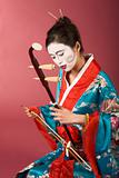 Geisha in kimono with erhu