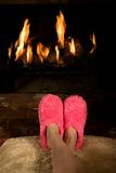 Warming feet by the fire