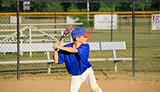 Boy Practicing Baseball