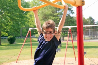 Boy Playing at the Playground