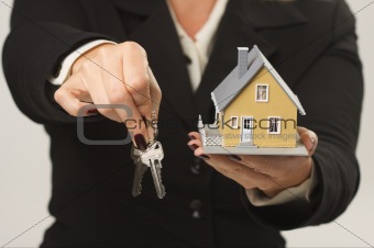 House and Keys in Female Hands