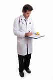 Doctor writing up patient record