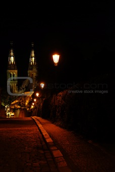 Road with lanterns and a cathedral