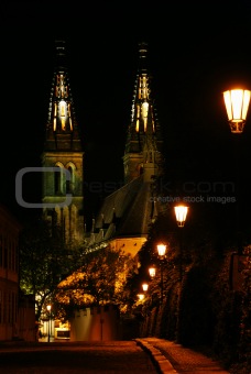 Road with lanterns and a cathedral