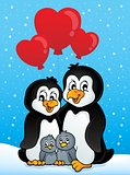 Valentine penguins in snow