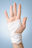 Injured hand with bandage