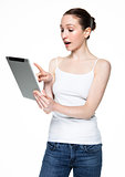 Beautiful woman browsing internet on tablet