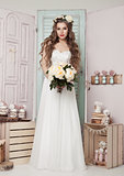 Beautiful young bride with flowers  romantic decoration