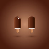 Chocolate and vanilla ice cream pops on brown background