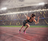 Woman runs in a race to the stadium