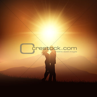 Silhouette of a couple in a sunset landscape