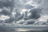 Cloudy sky over sea and horizon