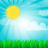 Sunny background with sun and grass.