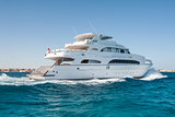 Large private motor yacht out at sea