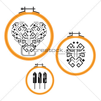 Needlework design on embroidery hoops.