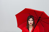 woman with red umbrella