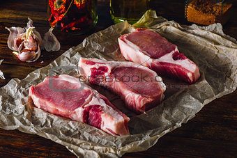 Three Pork Loin Chops on Paper
