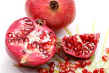 Pomegranate and seeds on plate