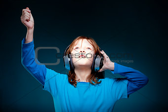 Boy Listening to Music in Headphones