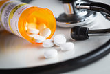 Non-Proprietary Medicine Prescription Bottles and Spilled Pills 