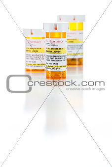 Three Non-Proprietary Medicine Prescription Bottle Isolated on W