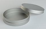 Metal round box on gray background