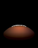 American Football Ball on a Dark Shadow Background Illustration