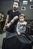 Small kid in barbershop