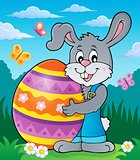 Bunny holding big Easter egg theme 2
