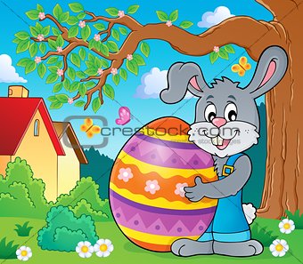 Bunny holding big Easter egg theme 3