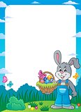Frame with bunny holding Easter basket