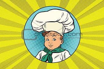boy in white chefs hat