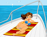 Girl sunbathing on yacht