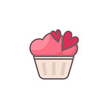 Cupcake decorated with hearts.