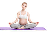 Portrait Of Pregnant Woman Doing Yoga