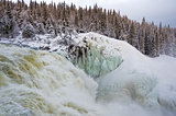 Tannoforsen waterfall in Sweden in winter