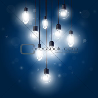 Luminous light bulbs hanging on cords - lamps