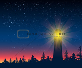 Landscape with silhouette of lighthouse at night