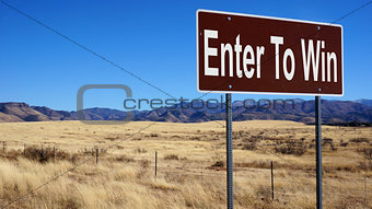 Enter To Win brown road sign