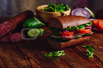 Sandwich with Salami and Fresh Vegetables