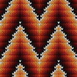 Knitted seamless pattern in warm hues