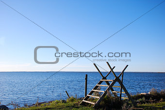 Wooden stile by the coast