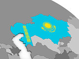 Kazakhstan on globe with flag