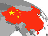 China on globe with flag