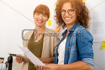 Two businesswoman working together