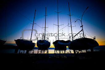 Sailboats at dry dock sunrise view